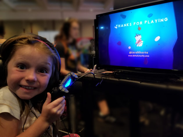 Tim's daughter Maezie enjoyed the Donut County demo at PAX