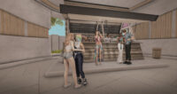 Several avatars chat at a coffee house in Second Life.