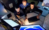 Boeing engineers at computer