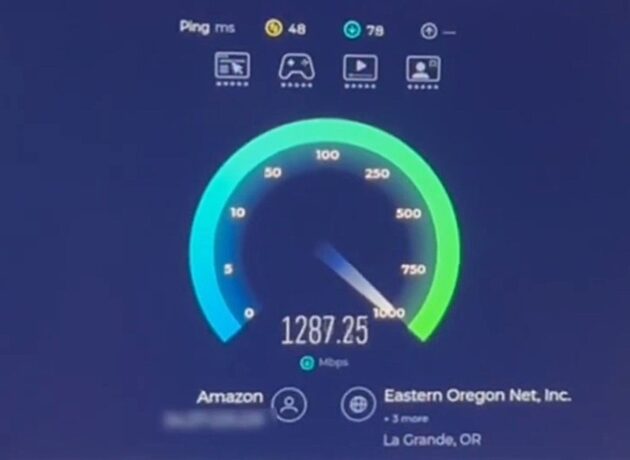 Screenshot showing downlink speed as 1287.25 Mbps on a dial